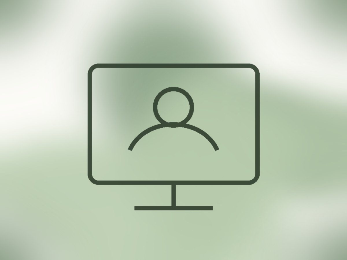 Senior adult having a virtual doctor consultation on a tablet with medications on the table.